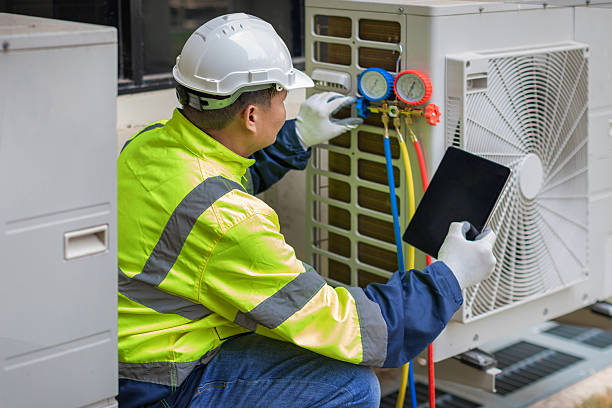 Professional Air Conditioning Repair technician working in Saukville, WI